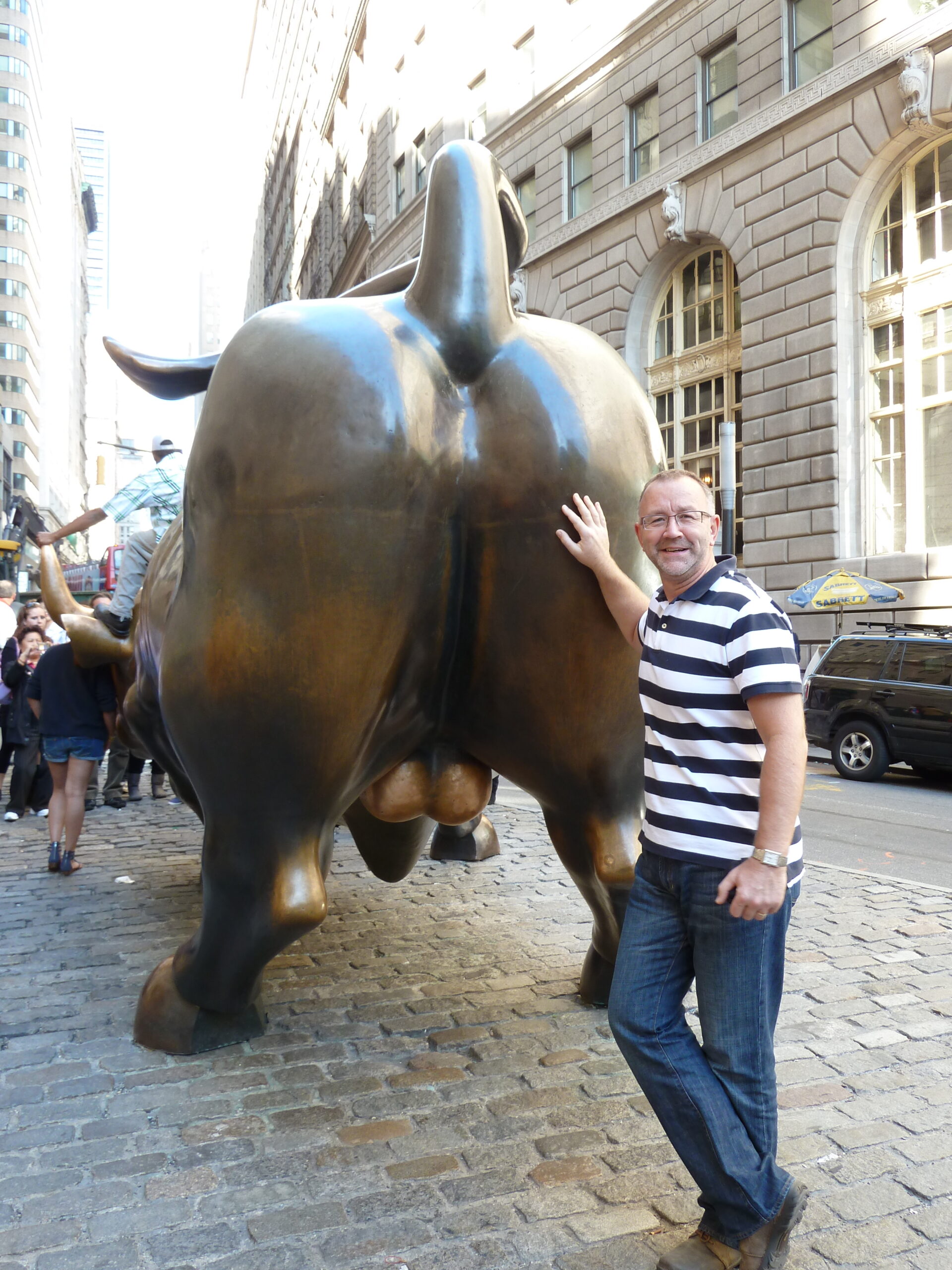 Chris visits Charging Bull near the New York Stock Exchange on Wall Street.